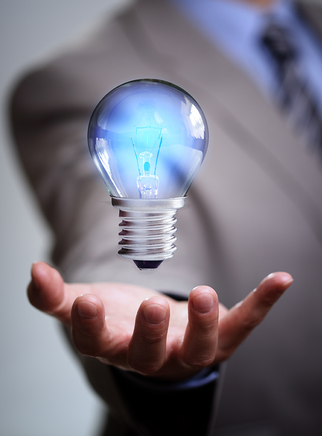 Businessman with illuminated light bulb concept for idea, innova